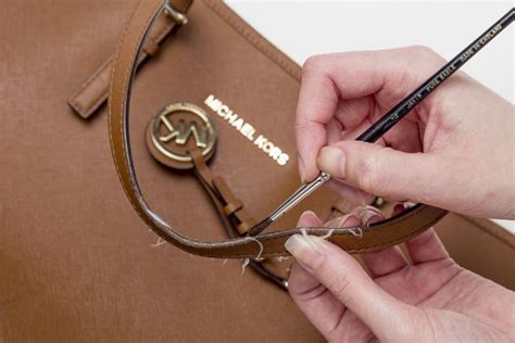 michael kors bag broken strap|Michael Kors purse straps fraying.